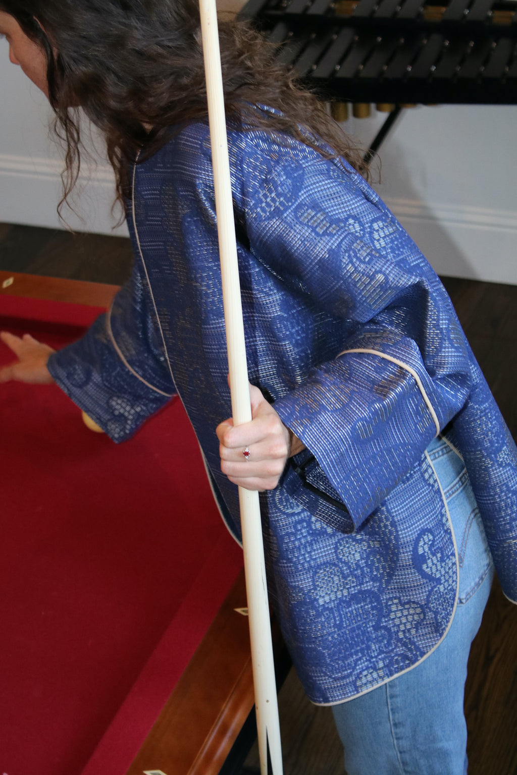 Person wearing a blue patterned garment