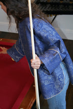 Person wearing a blue patterned garment